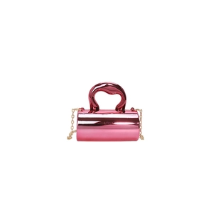 Pink metallic cylinder evening bag with gold chain strap and top handle design