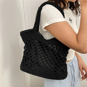 Handmade black woven cotton rope tote bag with mesh design and inner lining for women