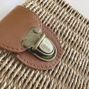 Summer woven straw crossbody bag with brown leather clasp and vintage bronze lock