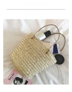 Top view of handmade straw bucket bag showing interior space for daily essentials