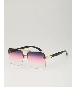 Detail of rimless oversized sunglasses with purple gradient lenses and gold bridge