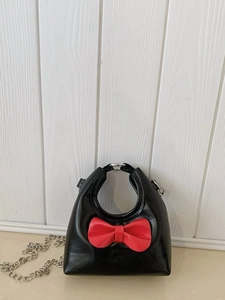 Sweet black gloss kids crossbody bag with red leather bow and silver metal chain