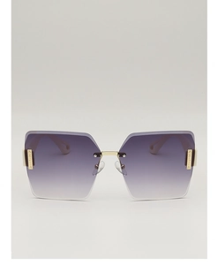 Close-up of diamond-cut rimless sunglasses with gradient purple lenses and gold metal hinges