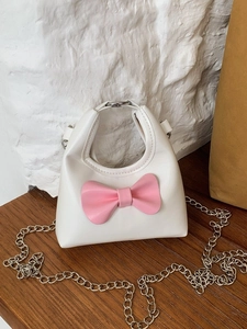 Mini pearl white girls crossbody bag with cute pink bow and silver chain strap