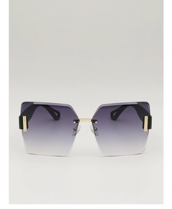 Close-up of frameless gradient purple lenses with gold metal temples and logo detailing