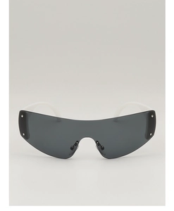 Détail de lunettes de soleil Y2K pour enfants avec verres sombres et branches blanches