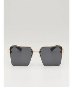 Detailed front view of oversized square sunglasses with gold metal semi-rimless frame