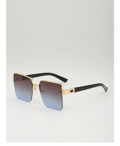 Macro view of square gradient lenses with gold metallic serrated edge detailing