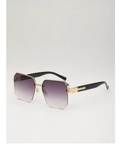 Macro detail of geometric gold metal frame and purple gradient lens on sunglasses