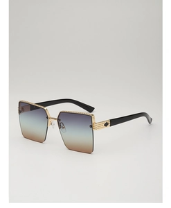 Close-up of golden metal frame sunglasses with purple to brown gradient lenses