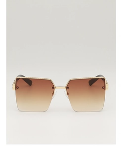 Macro detail of large metal half-frame sunglasses with gradient lenses and textured rim