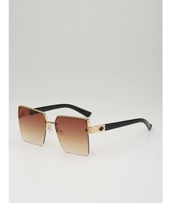 Detailed view of square metal half-frame sunglasses with brown gradient lenses and gold trim