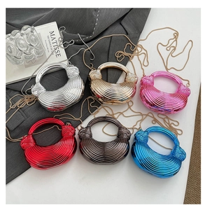 Detailed display of six vibrant pleated metallic acrylic mini bags with gold chain straps
