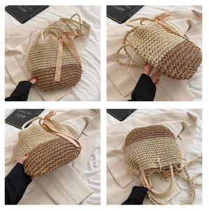 Detail of straw woven bag with contrast patchwork design and decorative silk bow