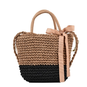 Straw tote bag with dual-tone woven design and decorative satin ribbon bow for women