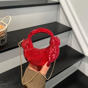 Metallic red crescent acrylic evening bag with pleated texture and round handle