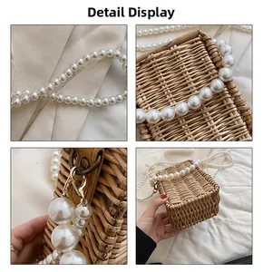 Close-up of woven straw handbag featuring large pearl chain handle and gold hardware detail