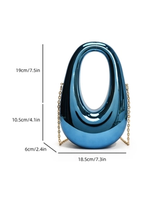 Detail view of navy acrylic evening bag with size dimensions and gold chain strap