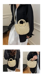 Detail of hand-woven beige beach bag with a round handle and drawstring lining