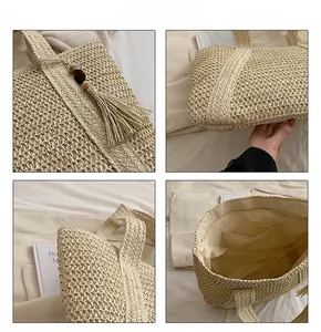 Detail view of woven straw tote bag with tassel charm and internal fabric lining pocket