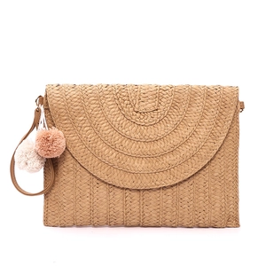 Handwoven straw envelope clutch with colorful pom-poms for beach and vacation