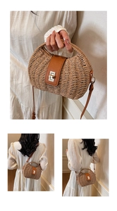 Detail view of woven straw handbag featuring brown leather flap and metal turn-lock closure