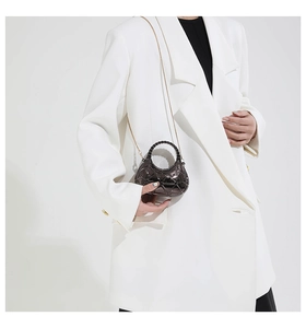 Mini acrylic hard shell clutch in gunmetal grey with geometric texture and chain