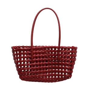 Handmade burgundy woven tote bag with hollow grid pattern and long shoulder strap