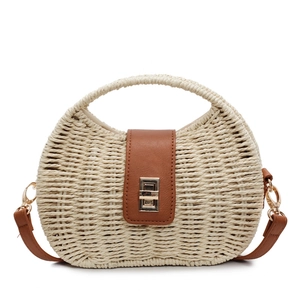 Minimalist straw woven handbag with brown leather flap and golden buckle for beach summer