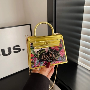 Golden acrylic mini evening bag with floral prints and chain strap for women