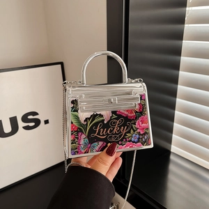 Silver mini handbag with Lucky floral print, metal round handle and chain strap
