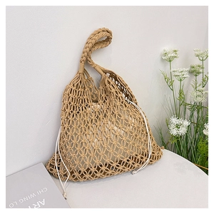 Detail of candy color cotton woven bag with mesh hollow design and drawstring inner pouch