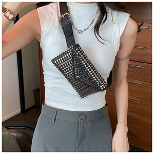 Detail of a punk style black PU leather waist bag featuring polished silver rivets