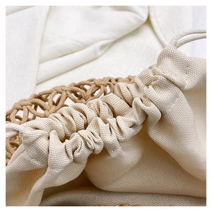 Detailed view of the off-white canvas drawstring lining for woven crochet handbags