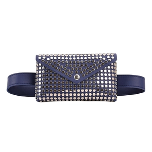 Close-up of deep blue leather waist bag featuring silver metal studs and belt strap detail