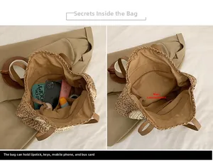 Detail of spacious straw tote bag interior showing compartments and large storage capacity