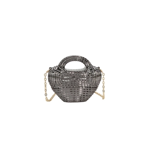 Chic dark gray acrylic woven handbag with golden metal chain strap on white background