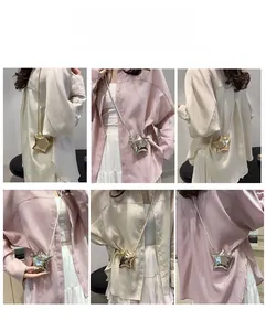 Mini sac bandoulière étoile avec finition miroir métallique et détails de perles