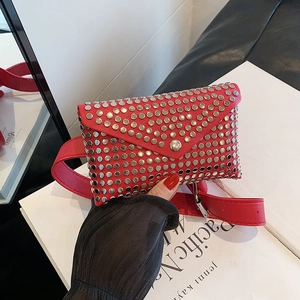 Red punk style waist bag with silver rivets and adjustable strap in high-quality leather