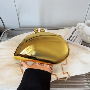 Elegant gold pebble-shaped evening clutch bag with chain strap and sphere clasp