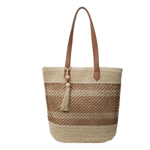 Sac de plage rayé en paille tissée avec anses en cuir et pompon décoratif