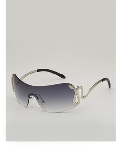 Detail of silver serpentine temples on rimless oversized gradient lens sunglasses