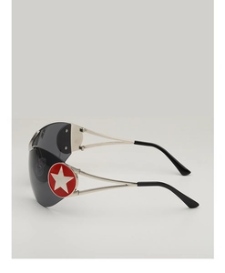 Detail of silver metal temples with a red star logo on retro Y2K pilot sunglasses
