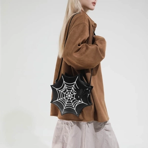 Halloween spider web crossbody bag with 3D spider accent and adjustable strap