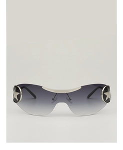 Detail of Y2K shield sunglasses featuring gradient lenses and silver star metal accents