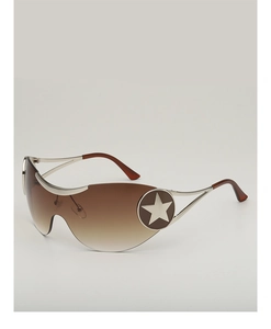 Detail of Y2K aviator sunglasses featuring a metallic star logo on silver temples