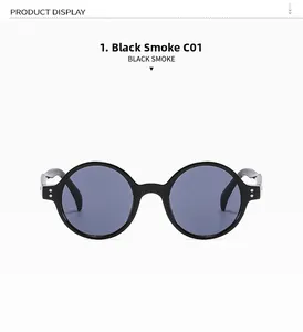 Vue de face des lunettes de soleil rondes rétro noires avec rivets métalliques argentés