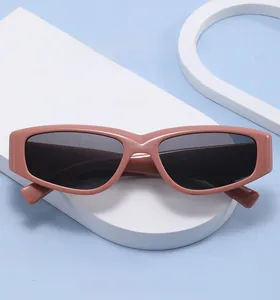 Detail view of pink retro cat eye sunglasses with UV shield and high-quality frames