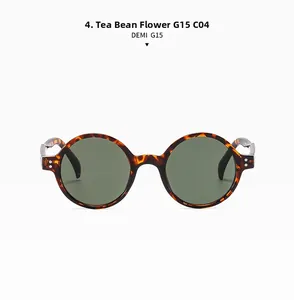 Détail de lunettes de soleil vintage rondes avec monture écaille et verres verts G15