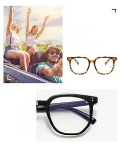Detail of tortoise and black frame glasses with rivet accents on the temples